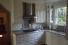 kitchen stove, drawers, cabinets
