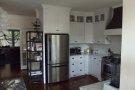 kitchen fridge and cabinets